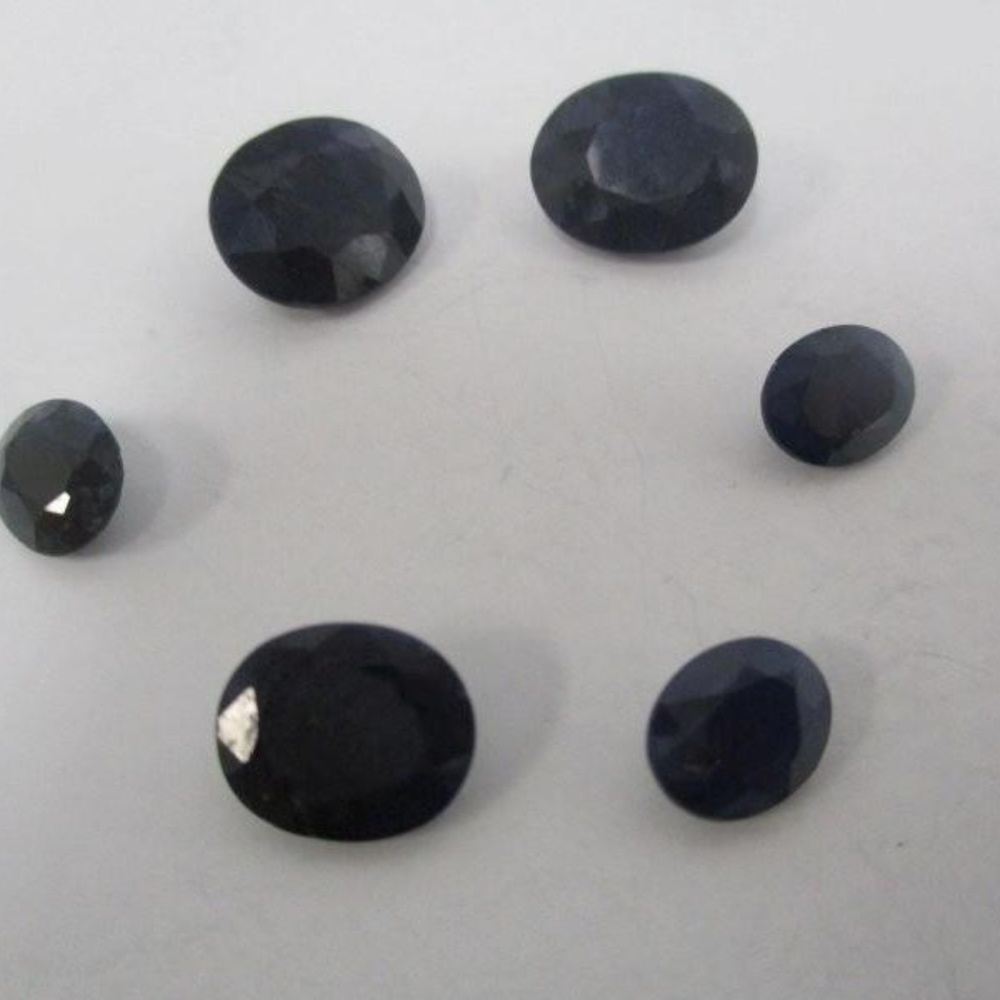 6 Dark Blue Sapphire's Totaling 25.35ctw.